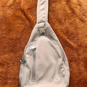 Madison West Striped Interior Bag